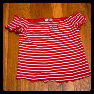 A crapped on or off the shoulder shirt.
